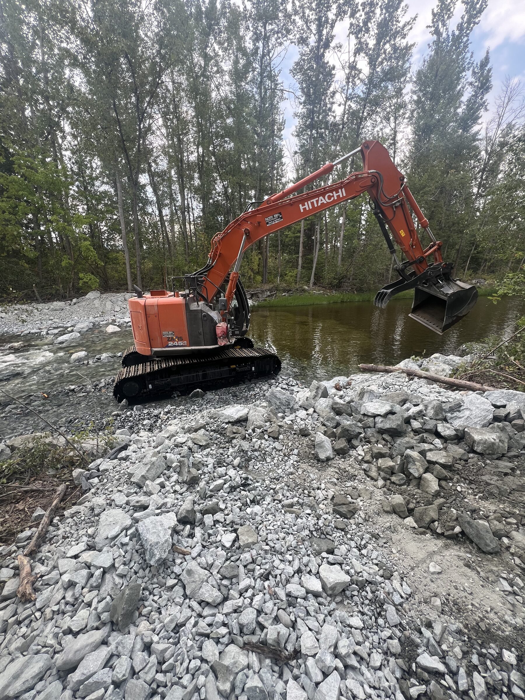 3SIXTY Excavation excavator working in water on environmental remediation site